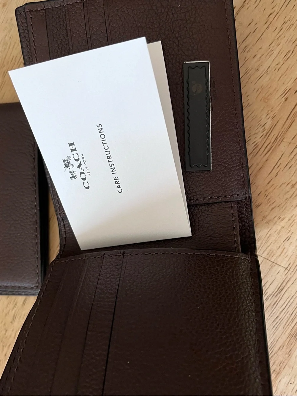 Coach Men's Pebbled Leather Bifold Wallet in Dark Brown